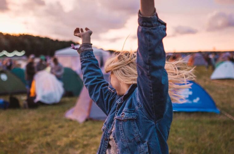 girl camping at festival